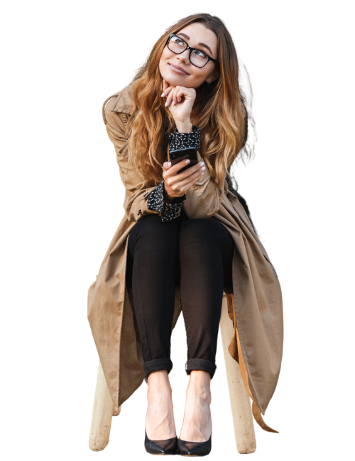 Attractive young woman, sitting on a stool, while holding her mobile device.