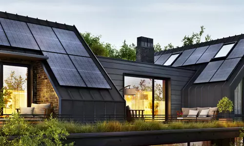 Modern house with roof terrace and solar panels