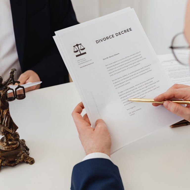 Man reviewing divorce papers.