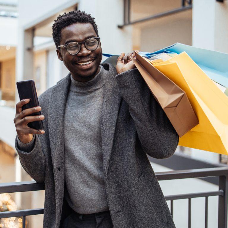 Millennial shopper in mall embracing dupe culture.