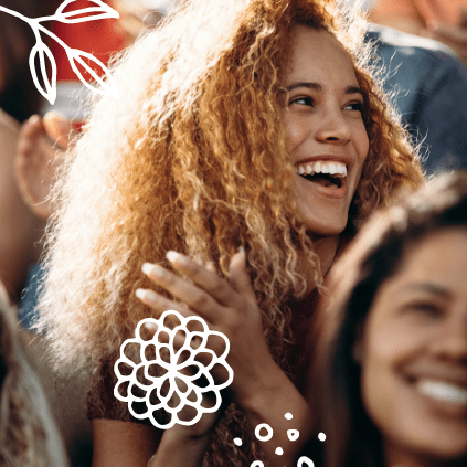After buying tickets with her Quorum Debit Card, a young woman enjoys the concert.