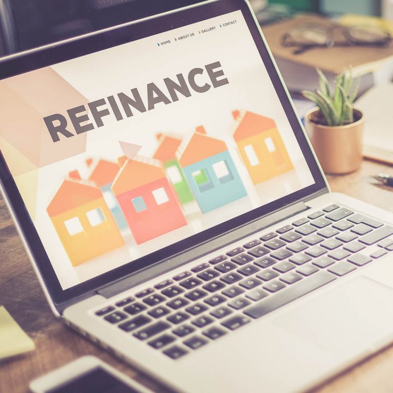 Computer monitor with "Refinance" on the screen.