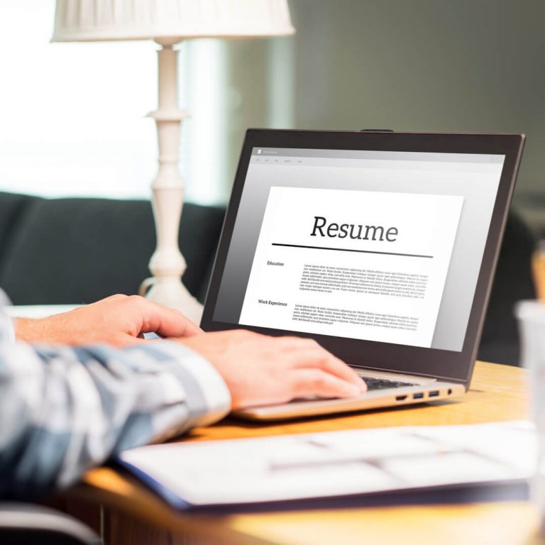 Closeup of computer screen with a job applicant's resume displayed.