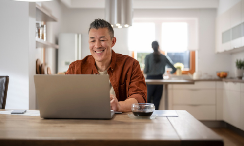 Man at desk working on computer