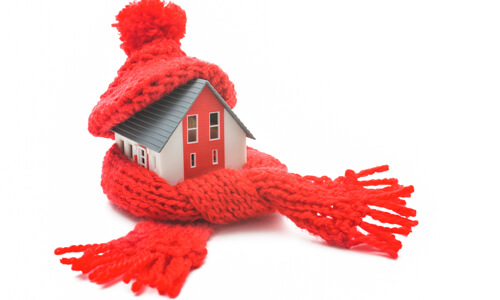 Home wrapped in scarp, illustrating getting your home ready for winter.