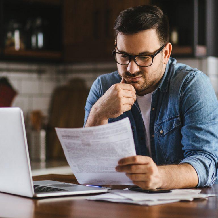 Man struggling with bills wondering if he still needs to save.