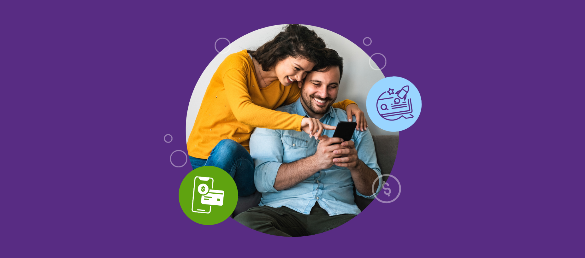 Man and woman at home looking at mobile phone.