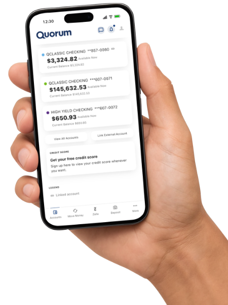 hand holding smartphone with Quorum mobile app on screen