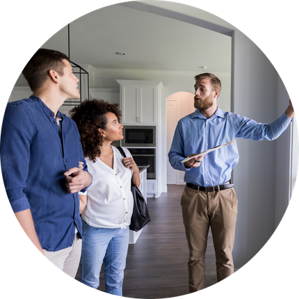 Couple and real estate agent looking at homes