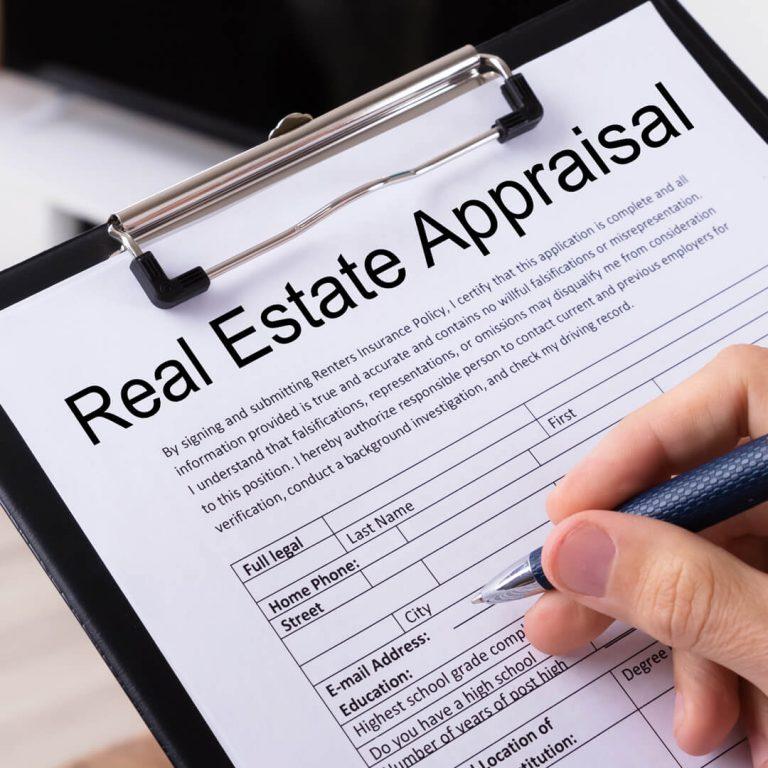 Clipboard showing a real estate appraisal.