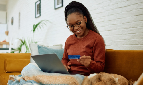 Woman at home shopping online