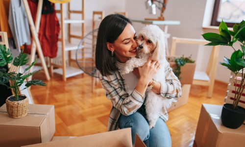 Woman and her dog in new home