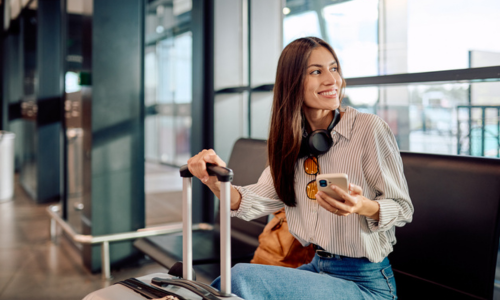 Woman at the airport waiting for flight