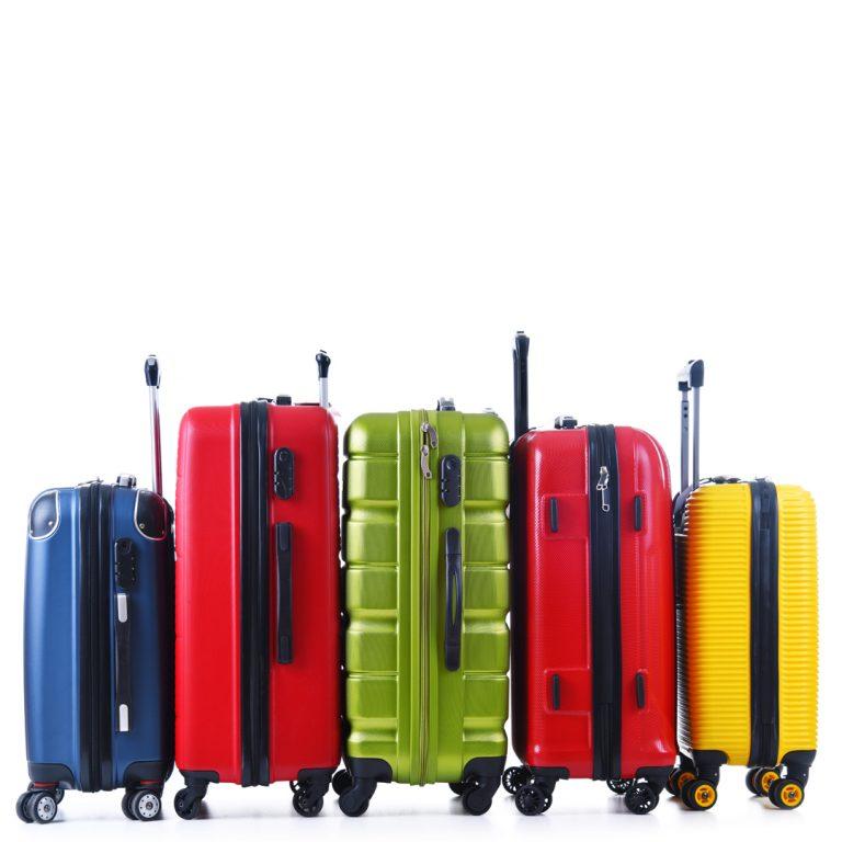 Bright luggage on a white background: a shopping deal to score in March.