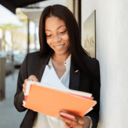 Young Woman Reviewing Papers